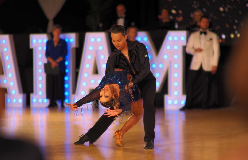 Pro ballroom dancing couple at CanAm DanceSport in Toronto